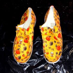 Orange-yellow pumpkin print sneakers